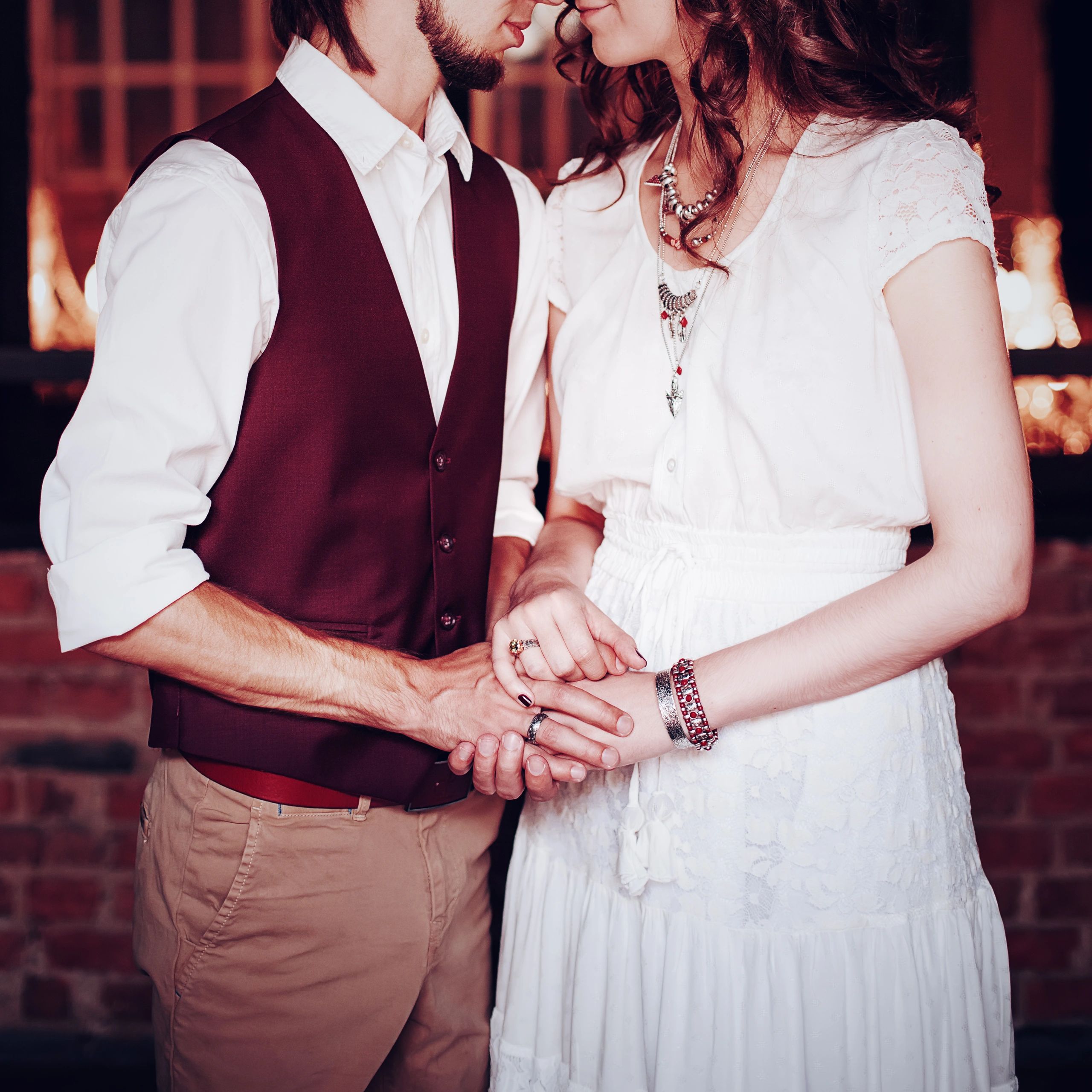 Wedding couple holding hands